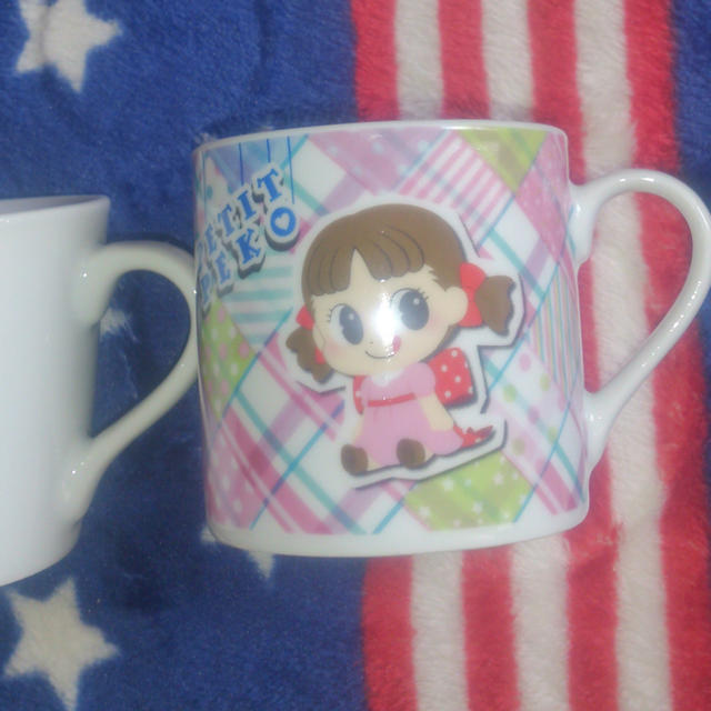 不二家(フジヤ)のペコちゃん カップ インテリア/住まい/日用品のキッチン/食器(グラス/カップ)の商品写真
