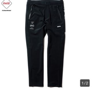 エフシーアールビー(F.C.R.B.)のF.C.R.B x COCA-COLA WARM UP PANTS黒M新品(その他)