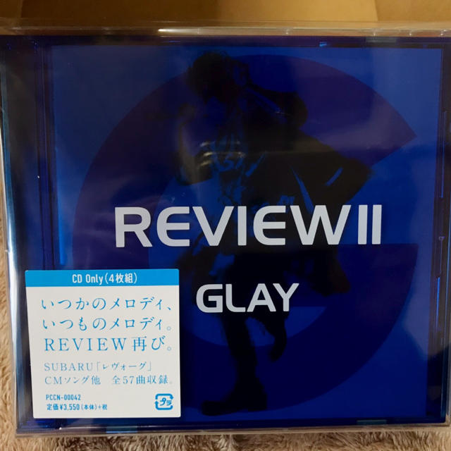 タグ付き  REVIEW2  GLAY  特典 ステッカー　ショッパー付き エンタメ/ホビーのCD(ポップス/ロック(邦楽))の商品写真