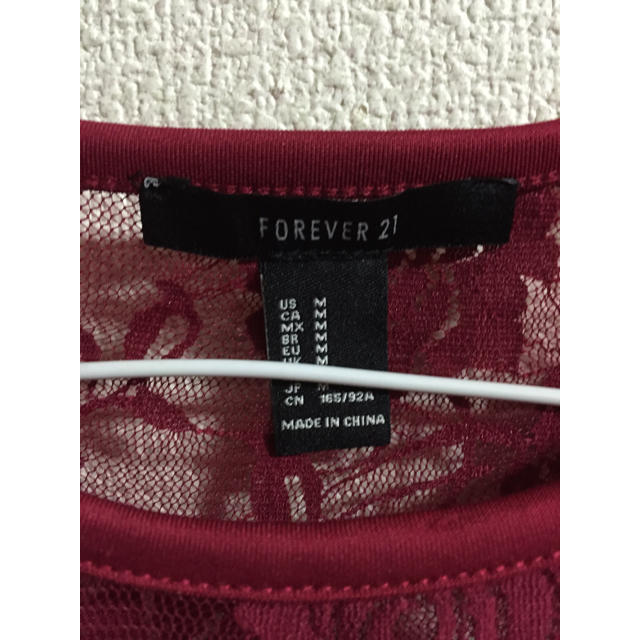 FOREVER 21(フォーエバートゥエンティーワン)の送料込み レース切替ペプラムカットソー レディースのトップス(タンクトップ)の商品写真