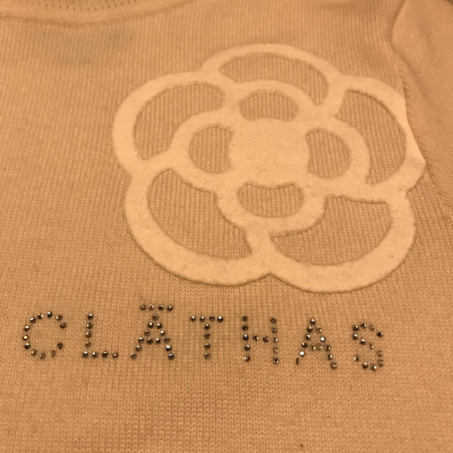 CLATHAS(クレイサス)のクレイサス　半袖タートルニット　アイボリー　カメリア　CLATHAS レディースのトップス(ニット/セーター)の商品写真