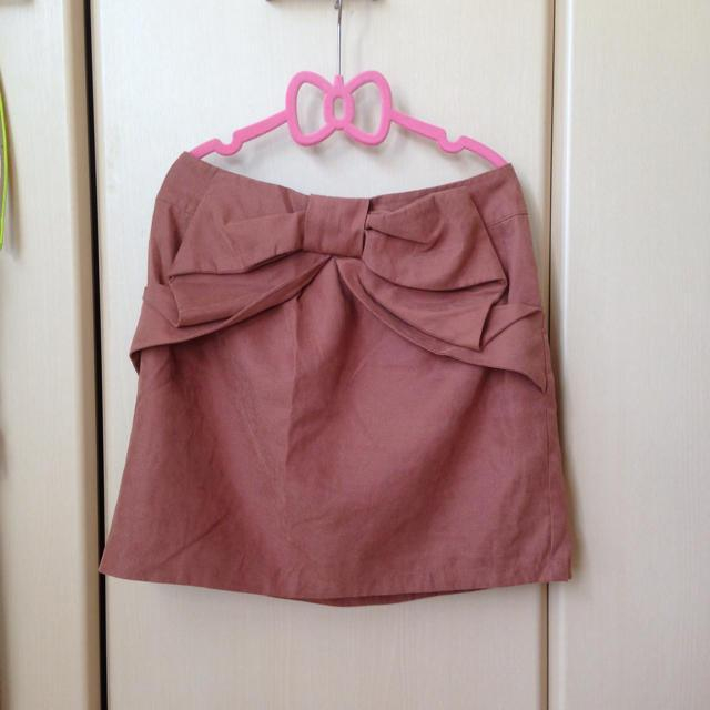one after another NICE CLAUP(ワンアフターアナザーナイスクラップ)の秋色リボンスカート。 レディースのスカート(ミニスカート)の商品写真