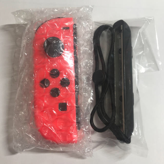 Nintendo Switch(ニンテンドースイッチ)の新品未使用 Switch Joy-Con L ネオンレッド 美品 エンタメ/ホビーのゲームソフト/ゲーム機本体(家庭用ゲーム機本体)の商品写真