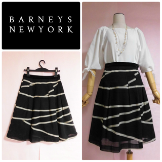 バーニーズニューヨーク(BARNEYS NEW YORK)の【バーニーズニューヨーク】シックな柄＆色のタックフレアスカート(ひざ丈スカート)