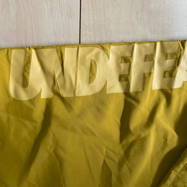 UNDEFEATED(アンディフィーテッド)のundefeated × champion nylon pants XL 新品 メンズのパンツ(その他)の商品写真
