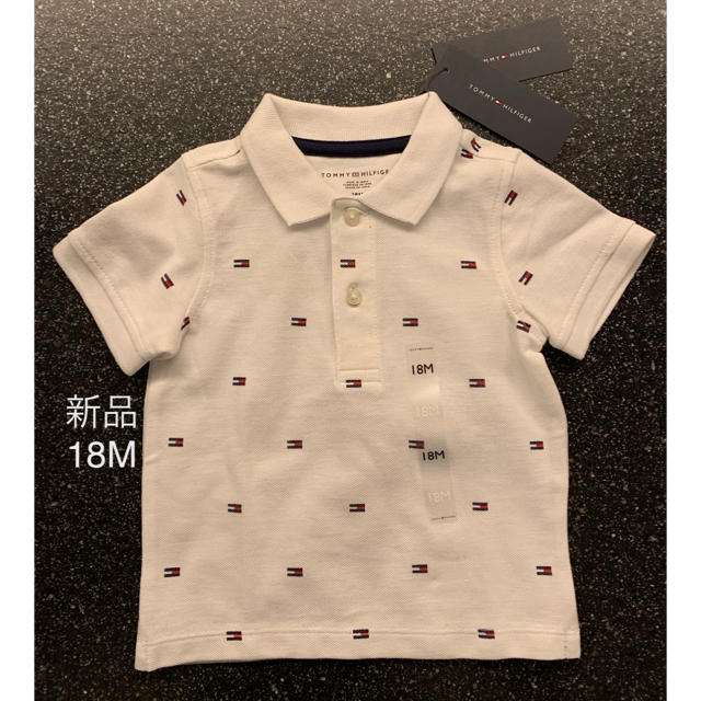 TOMMY HILFIGER(トミーヒルフィガー)の【新品】トミーヒルフィガー　ポロシャツ　ロゴ　トミー　白 キッズ/ベビー/マタニティのベビー服(~85cm)(シャツ/カットソー)の商品写真