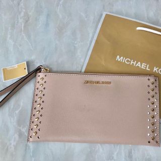 マイケルコース(Michael Kors)の新品  マイケルコース  スタッズケイトスペードストライプポーチピンク(ポーチ)