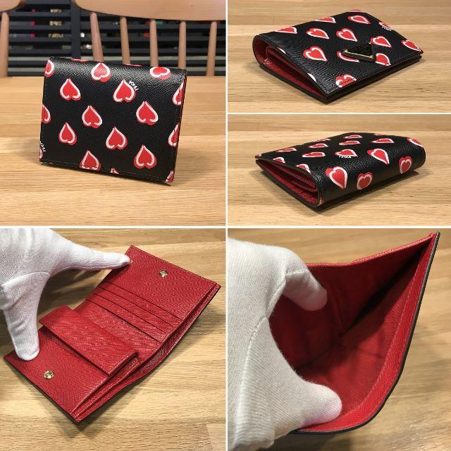 PRADA(プラダ)のyuuna様の 新品同様 プラダ 現行 コンパクト財布 ハート柄 黒 赤 レディースのファッション小物(財布)の商品写真