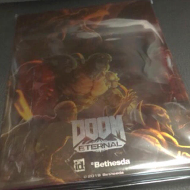 PlayStation4(プレイステーション4)のDOOM ETERNAL ゲオ限定　スチールケース エンタメ/ホビーのゲームソフト/ゲーム機本体(その他)の商品写真