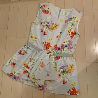 チェスティ(Chesty)の【ミナミン様専用】chesty 花柄ペプラムトップス(カットソー(半袖/袖なし))