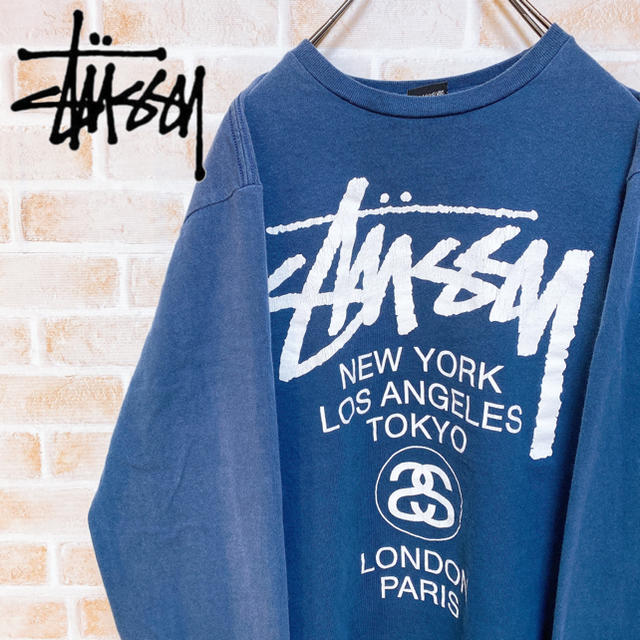 STUSSY(ステューシー)の【激レア‼︎】ステューシー◎ワールドツアーロゴ 両面プリント ロングTシャツ メンズのトップス(Tシャツ/カットソー(七分/長袖))の商品写真