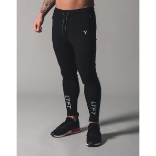 ナイキ(NIKE)の新品未使用LYFTリフトPIPING 2WAY STRETCH PANTS(その他)