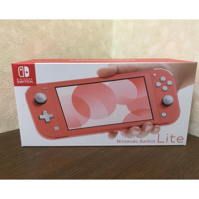 任天堂(ニンテンドウ)のNintendo Switch NINTENDO SWITCH LITE コーラ エンタメ/ホビーのゲームソフト/ゲーム機本体(家庭用ゲーム機本体)の商品写真