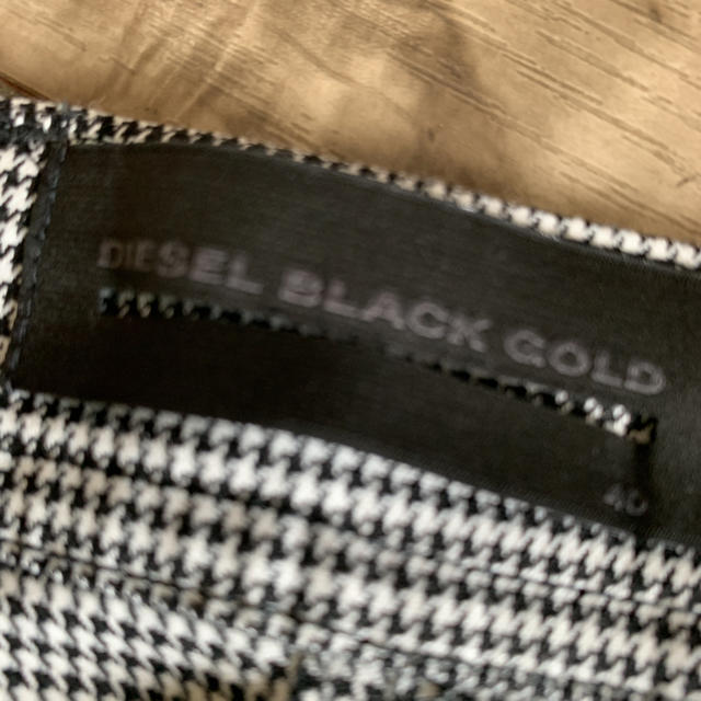 DIESEL(ディーゼル)のディーゼルブラックゴールド　スカート レディースのスカート(ひざ丈スカート)の商品写真