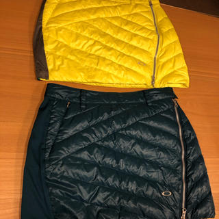オークリー(Oakley)の２着セットオークリー 中綿ダウンゴルフ レディース 巻きスカート L 黄色　緑(ウエア)