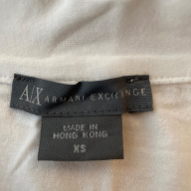 ARMANI EXCHANGE(アルマーニエクスチェンジ)のアルマーニ　エクスチェンジ　ポロシャツ　白 メンズのトップス(Tシャツ/カットソー(半袖/袖なし))の商品写真