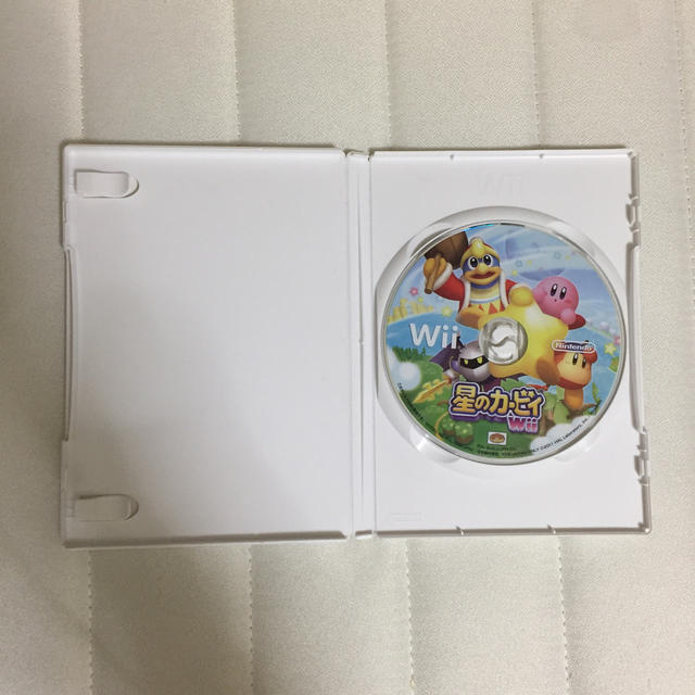 Wii(ウィー)の星のカービィ Wii (説明書なし) エンタメ/ホビーのゲームソフト/ゲーム機本体(家庭用ゲームソフト)の商品写真