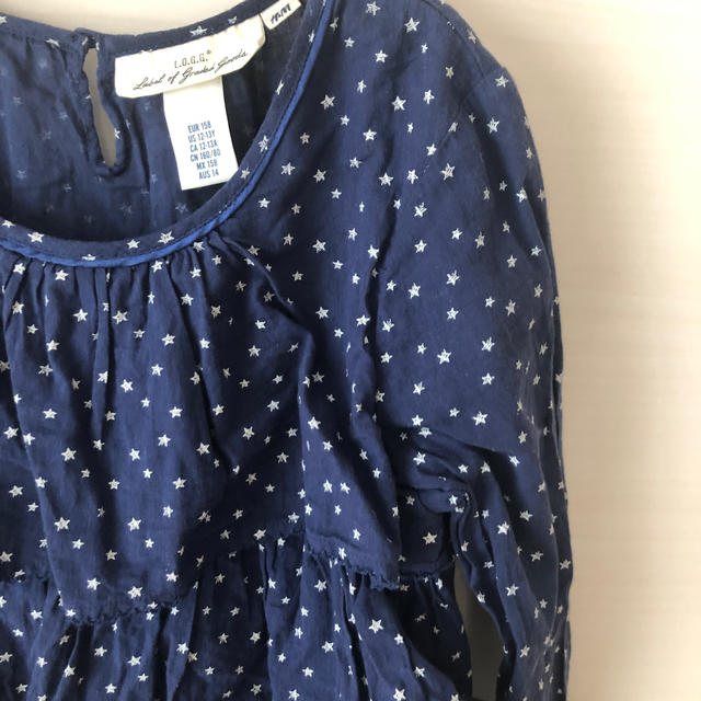 H&M(エイチアンドエム)の星プリントディアードチュニック キッズ/ベビー/マタニティのキッズ服女の子用(90cm~)(ブラウス)の商品写真