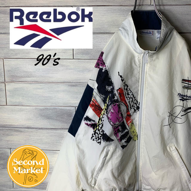 Reebok(リーボック)の【激レア】リーボック 90's ナイロンジャケット ベクターロゴ 柄 メンズのジャケット/アウター(ナイロンジャケット)の商品写真
