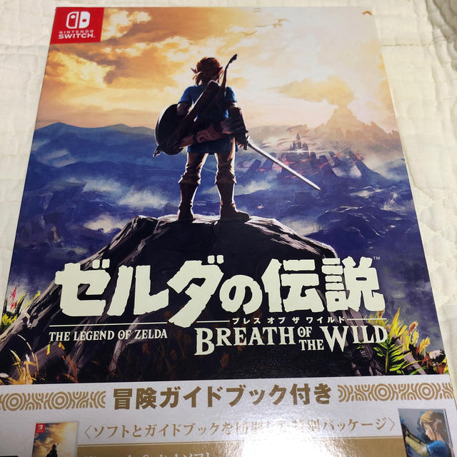 Nintendo Switch(ニンテンドースイッチ)の新品未開封ゼルダの伝説 ブレス オブ ザ ワイルド 冒険ガイドブック＆マップ付き エンタメ/ホビーのゲームソフト/ゲーム機本体(家庭用ゲームソフト)の商品写真