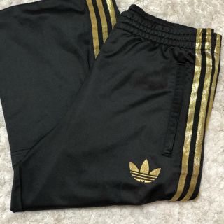 アディダス(adidas)のadidas ラインパンツ　ゴールド(その他)