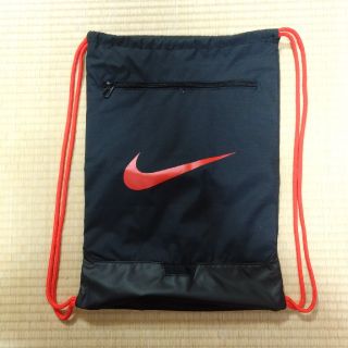 ナイキ(NIKE)のしーすけ様専用ナイキ　ナップザック　黒✕赤(リュック/バックパック)