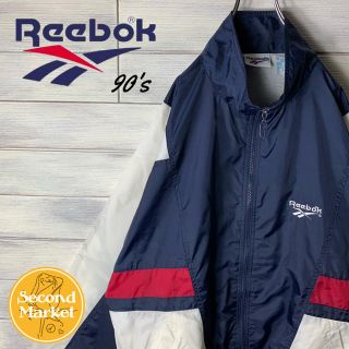 リーボック(Reebok)の【レア】リーボック 90's ナイロンジャケット ベクターロゴ ゆるだぼ(ナイロンジャケット)