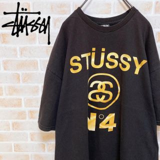 ステューシー(STUSSY)の【激レア】STUSSY◎シャネルロゴ グラフィック ゴールド Tシャツ(Tシャツ/カットソー(半袖/袖なし))