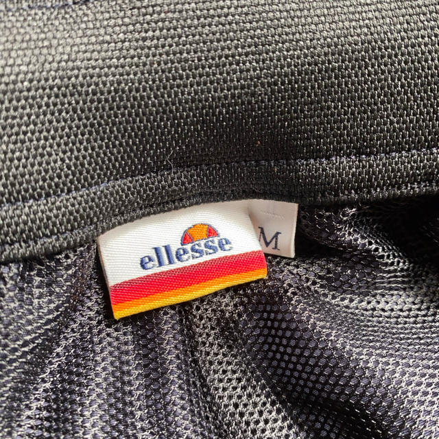 ellesse(エレッセ)のellesse サイドロゴ ウインド パンツ ナイロン エレッセ ジャージ メンズのパンツ(その他)の商品写真