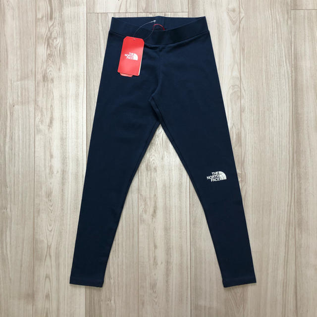 THE NORTH FACE(ザノースフェイス)のドルチェ様　専用　TNF ノースフェイス　キッズ　レギンス　ブルー　140cm キッズ/ベビー/マタニティのキッズ服女の子用(90cm~)(パンツ/スパッツ)の商品写真