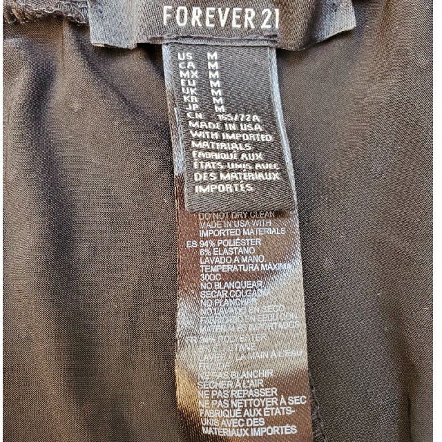 FOREVER 21(フォーエバートゥエンティーワン)のFOREVER21　レギンス　黒地　金ドット模様　M レディースのレッグウェア(レギンス/スパッツ)の商品写真