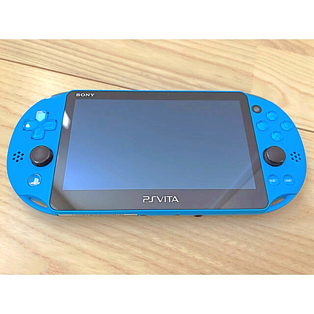 PlayStation Vita(プレイステーションヴィータ)の美品　PlayStation Vita ＋ソフト６本＋ケース２個 エンタメ/ホビーのゲームソフト/ゲーム機本体(携帯用ゲーム機本体)の商品写真