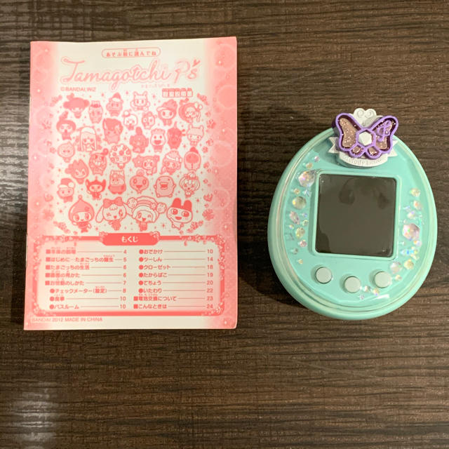 BANDAI(バンダイ)のM&Mさま　　たまごっちピース　グリーン　たまデコピアス付 エンタメ/ホビーのゲームソフト/ゲーム機本体(携帯用ゲーム機本体)の商品写真