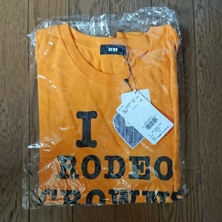 ロデオクラウンズ(RODEO CROWNS)のロデオクラウン オレンジTシャツ(Tシャツ(半袖/袖なし))