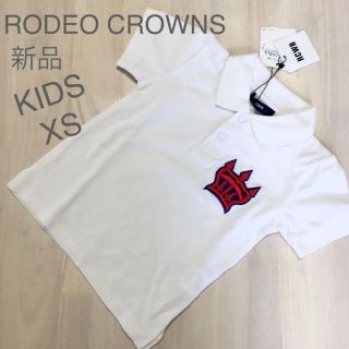 ロデオクラウンズワイドボウル(RODEO CROWNS WIDE BOWL)の キッズXS✨新品タグ付き✨ロデオクラウンズ❤️ポロシャツ白(Tシャツ/カットソー)