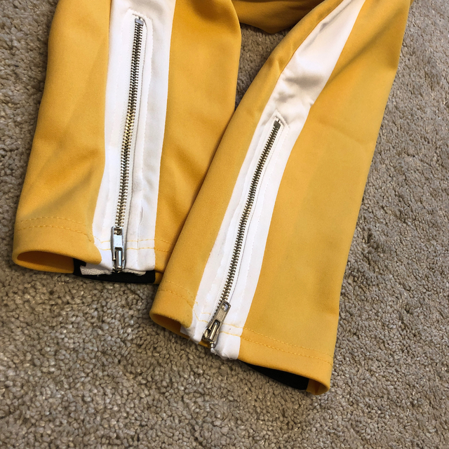 DLSM トラックパンツ yellow メンズのパンツ(その他)の商品写真