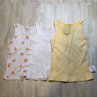 ユニクロ(UNIQLO)のユニクロコットンメッシュタンクトップ3枚組☆90サイズ☆おさるイエロー系used(下着)