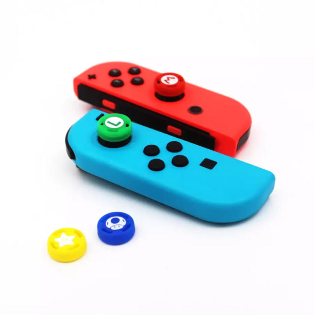 Nintendo Switch(ニンテンドースイッチ)の新品　Nintendo 任天堂　switch ジョイコンスティックカバー　4個 エンタメ/ホビーのゲームソフト/ゲーム機本体(携帯用ゲーム機本体)の商品写真