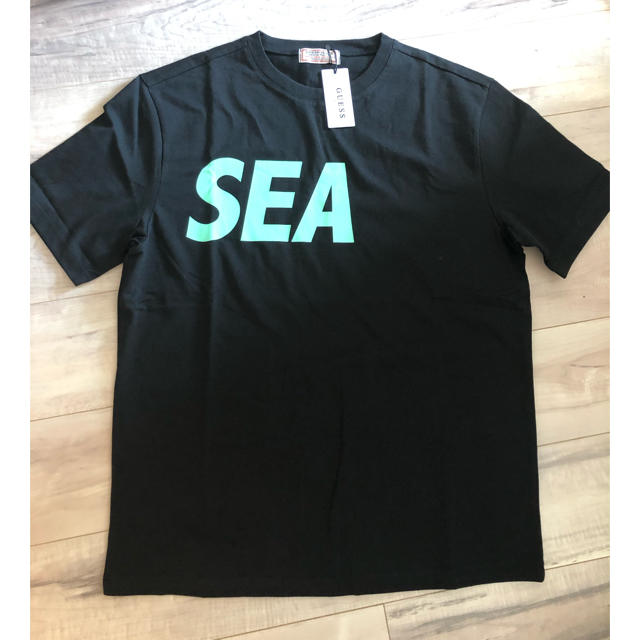 GUESS(ゲス)のraraさん　WIND AND SEA ＋GUESS  TシャツM メンズのトップス(Tシャツ/カットソー(半袖/袖なし))の商品写真