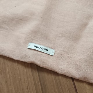 ミュウミュウ(miumiu)のMIUMIU コットン巾着(ポーチ)