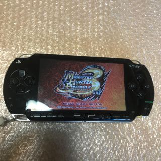 プレイステーションポータブル(PlayStation Portable)のPSP1000本体 純正バッテリー+メモステ4GB+モンハン3rd付き(携帯用ゲーム機本体)