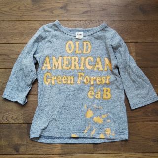 エーアーベー(e.a.B)のeaBエーアーベーロングTシャツグレーイエローA英語7分丈(Tシャツ/カットソー)