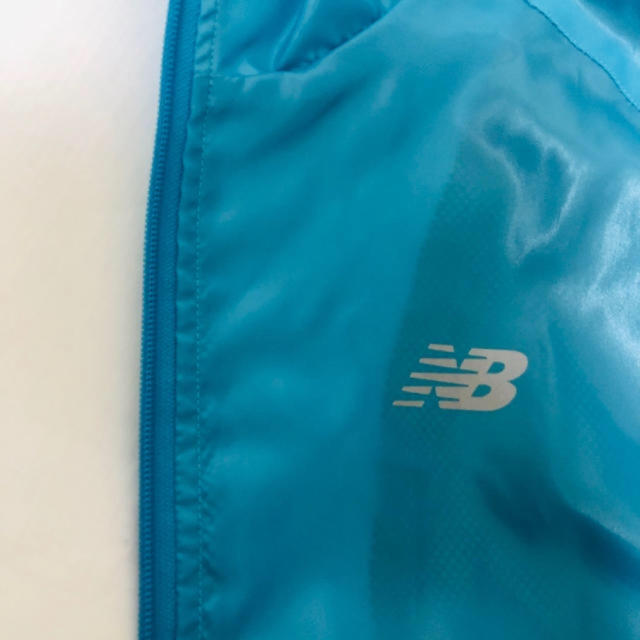 New Balance(ニューバランス)の☆美品　ニューバランス　半袖ウインドジャケット  ブルーグリーン　 M メンズのジャケット/アウター(ナイロンジャケット)の商品写真