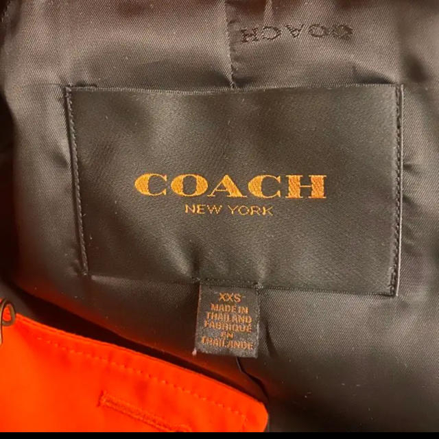 COACH(コーチ)のコーチ　XXS オレンジ　春秋トレンチコート レディースのジャケット/アウター(トレンチコート)の商品写真