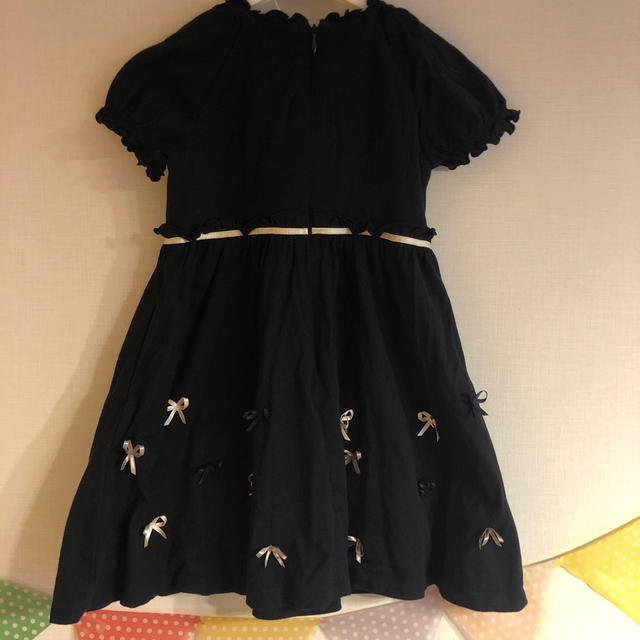 TOCCA(トッカ)の【pたん0115様専用】tocca 黒 リボン ワンピース 110 キッズ/ベビー/マタニティのキッズ服女の子用(90cm~)(ワンピース)の商品写真