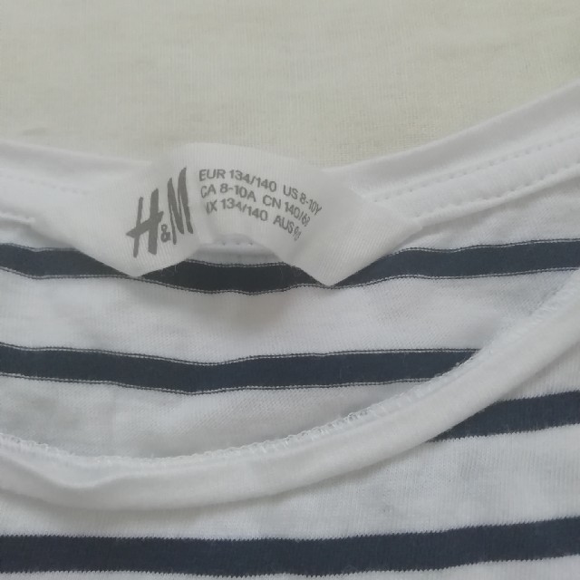 H&M(エイチアンドエム)のH＆M スパンコール ボーダーTシャツ キッズ/ベビー/マタニティのキッズ服女の子用(90cm~)(Tシャツ/カットソー)の商品写真