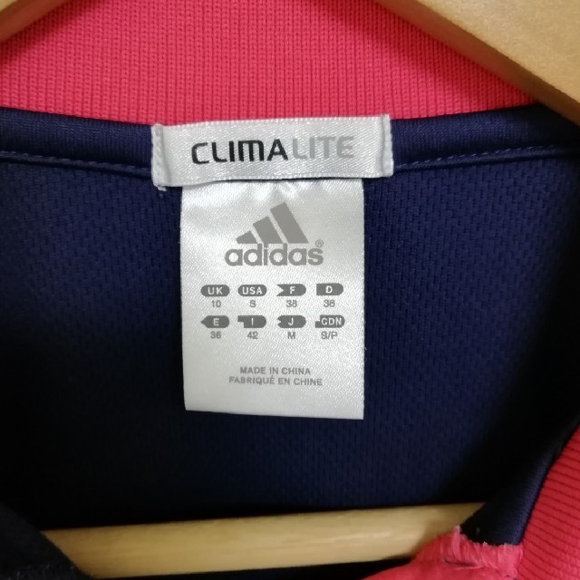 adidas(アディダス)の月見バーガー様専用　　アディダス ポロシャツ　紺　レディース　M　スポーツ レディースのトップス(ポロシャツ)の商品写真