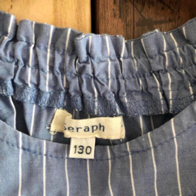 Seraph(セラフ)の美品 セラフ  ストライプ プルオーバー インディゴブルー 130 リボン キッズ/ベビー/マタニティのキッズ服女の子用(90cm~)(Tシャツ/カットソー)の商品写真