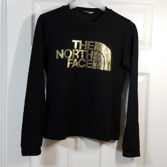 THE NORTH FACE(ザノースフェイス)のノースフェイス 【美品】【稀少】ゴールド ロゴ 長袖 Ｔシャツ ロンT 黒 L レディースのトップス(Tシャツ(長袖/七分))の商品写真