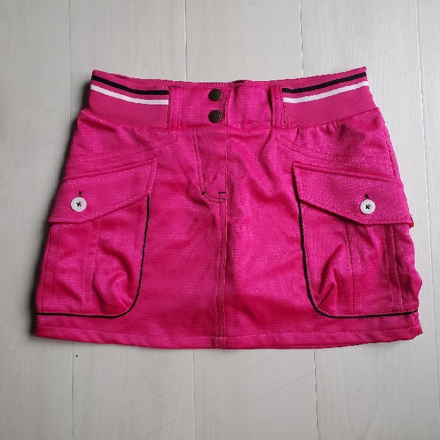 FILA(フィラ)のFILA☆ショッキングピンクインナーパンツ付きスカート スポーツ/アウトドアのゴルフ(ウエア)の商品写真